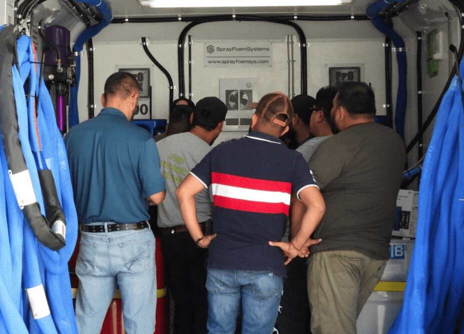 spray foam rig training group learning hands on inside mobile spray foam rig