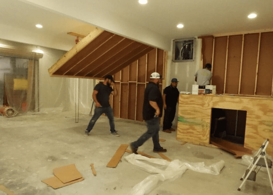 spray foam training room - mock up cathedral roof deck, framed wall cavities, crawl space for hands on spf training prepping the site