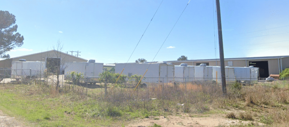 spray foam systems back of buildings 1 and 2 mobile spray foam rig lot